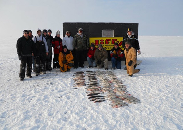 group ice fishing with guide sturgeon bay